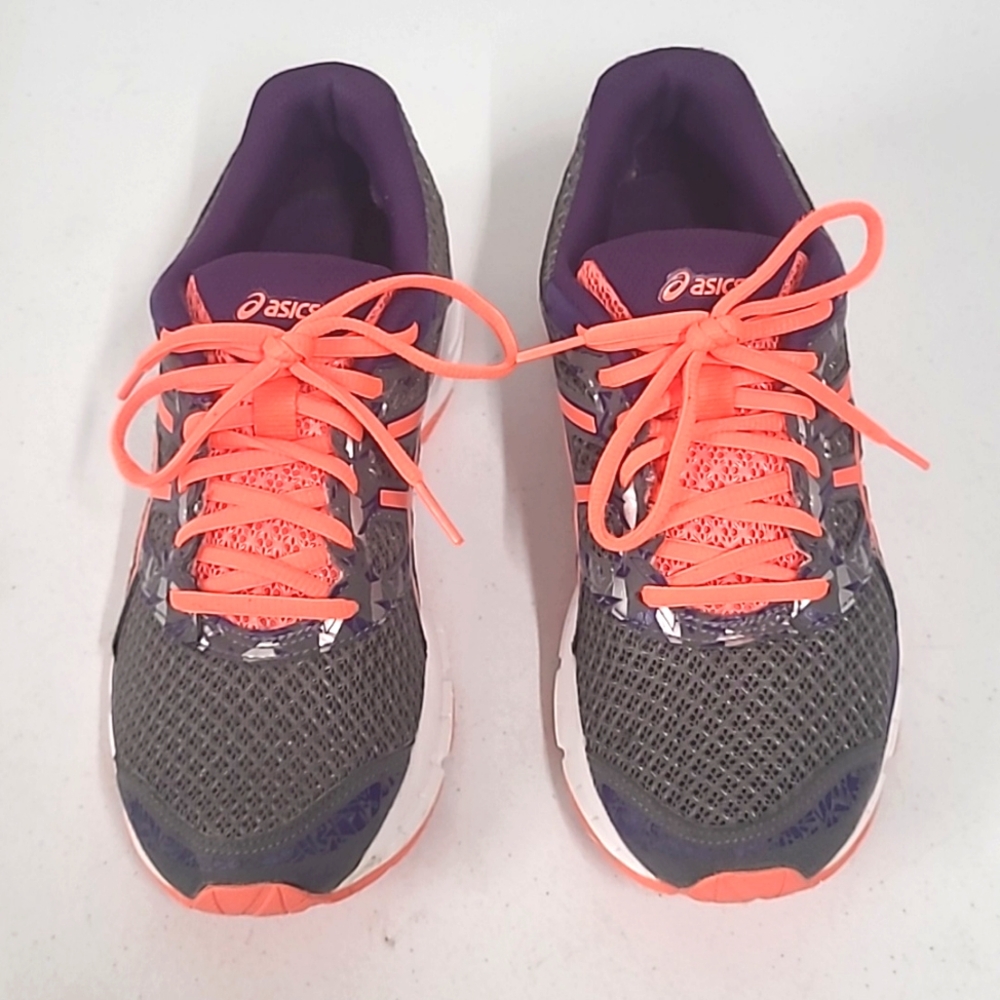 ASICS sneakers size 8.5 gently worn in very good condition.